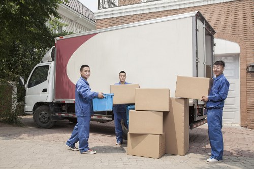 Furniture pick-up team collecting bulky household items in a Lambeth flat