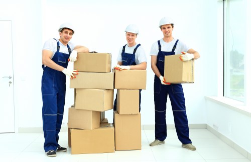 Careful loading of furniture and boxes into a moving van