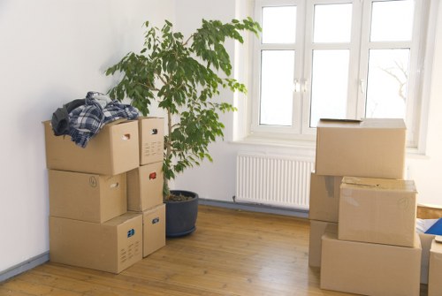 Furniture pick-up workers loading office furniture for a Lambeth business