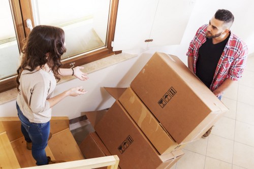Checklist and packed furniture ready for transport from a Lambeth property