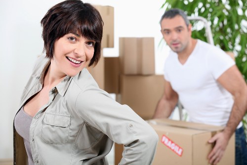 Transport and loading service with furniture and boxes ready for van transfer