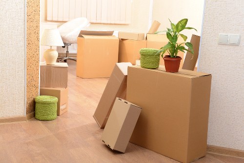Local moving team handling boxes and furniture for a Lambeth customer