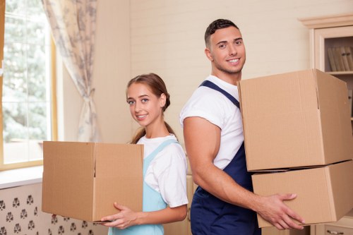 Packed office boxes and furniture prepared for commercial transport