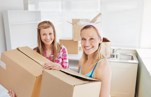Assorted packing materials including wardrobe boxes and bubble wrap